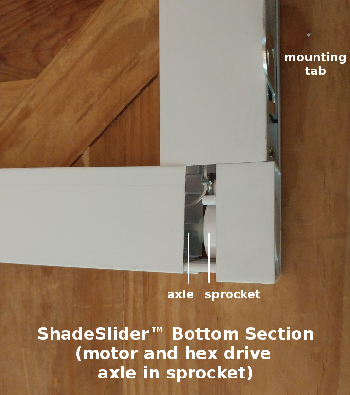 ShadeSlider for skylights - motorized drive axle mated with sprocket ShadeSlider for skylights - motorized drive axle mated with sprocket